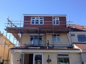 A Flat Roof Dormer Loft Conversion in Bristol with scaffolding surrounding