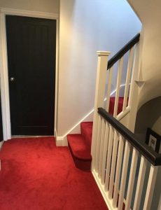 A landing and stairs leading to a loft conversion